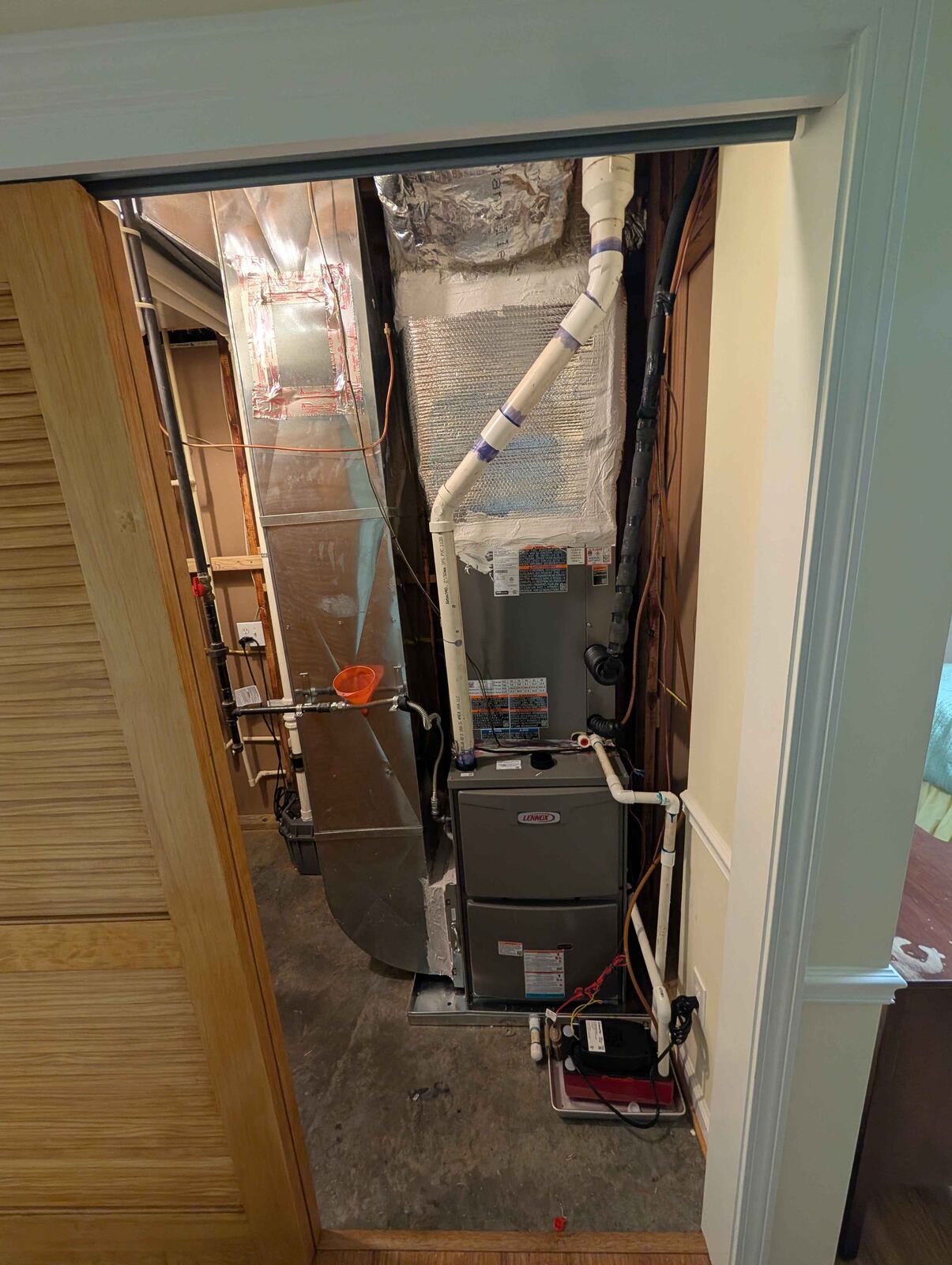 Closet air handler installed in a tight space